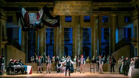 You are currently viewing Κωνσταντίνος Μπούρας:  Στην ανανεωμένη κι ανανεωτική Λυρική μας Σκηνή απολαύστε την όπερα Αντρέα Σενιέ τού Ουμπέρτο Τζορντάνο